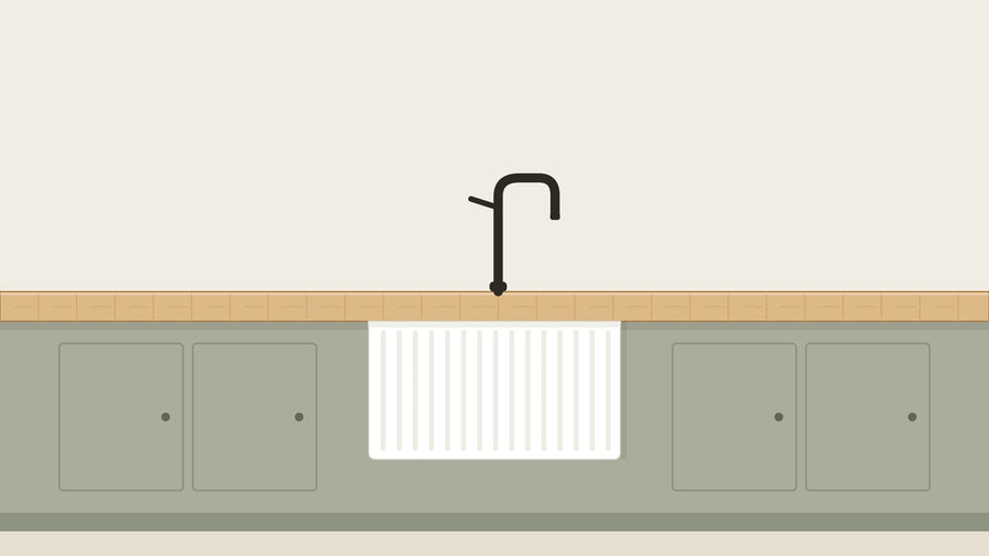 White farmhouse sink with butcher block countertop and matte black faucet in a warm modern kitchen illustration