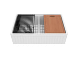 Top view of 33" fireclay double bowl farmhouse sink with integrated workstation, roll-up drying grid, and sapele cutting board