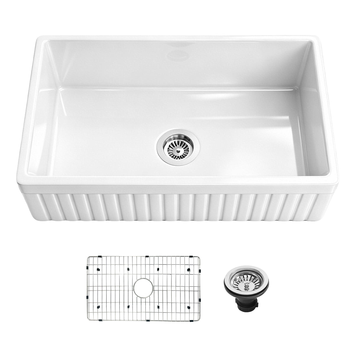 33 inch reversible apron fireclay farmhouse sink shown with fluted front, stainless steel bottom grid, and drain assembly.