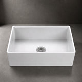 NOZLOO 33 inch smooth apron fireclay farmhouse sink, front close-up with strainer drain