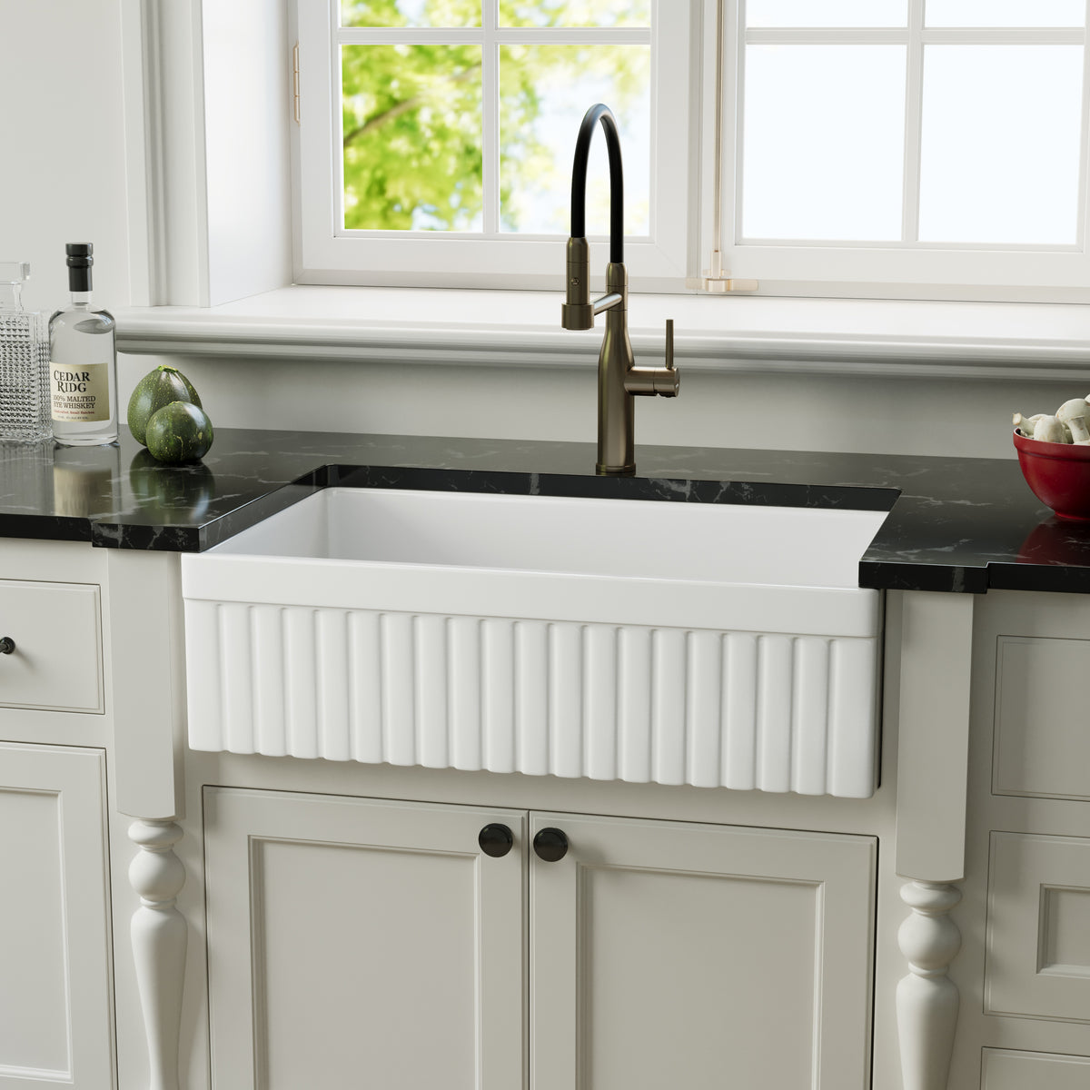 33 inch reversible apron fireclay farmhouse sink with fluted front and black countertop