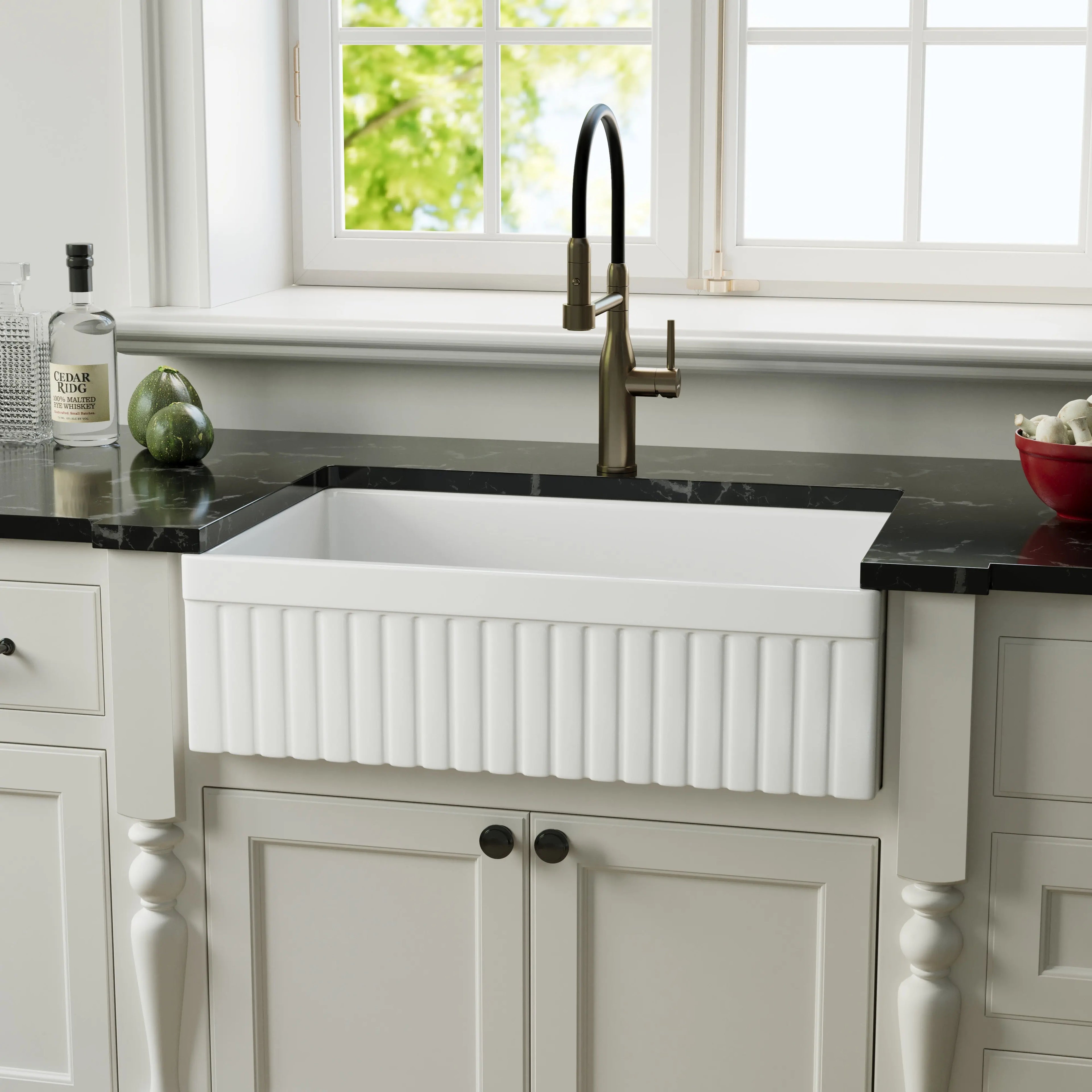 33 inch reversible apron fireclay farmhouse sink with fluted front and black countertop