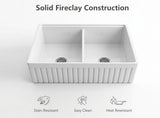 Close-up of 33" fireclay double bowl farmhouse sink highlighting solid fireclay construction, non-porous surface, and durable design