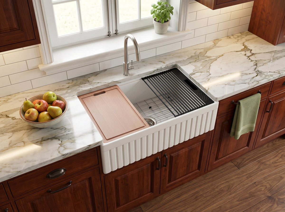 33 inch ribbed apron fireclay farmhouse sink installed in kitchen with cutting board and roll-up drying rack