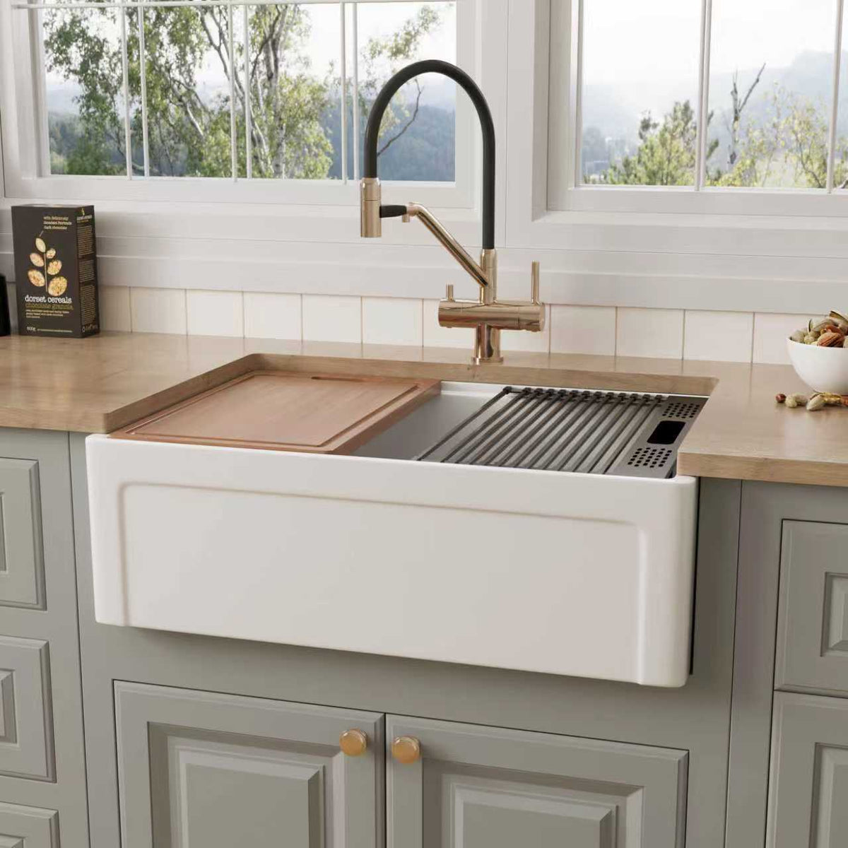 30 inch fireclay farmhouse workstation sink shown with the grooved recessed-panel side of its reversible apron facing out