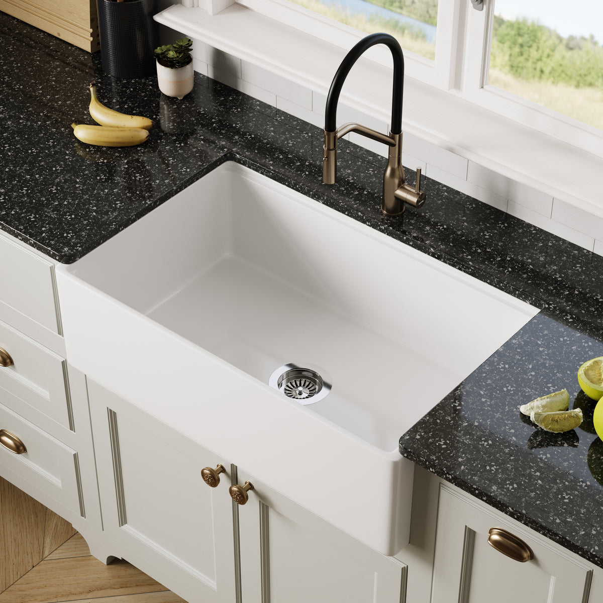 White 33" Smooth Apron Fireclay Farmhouse Sink with black granite countertop and brass faucet